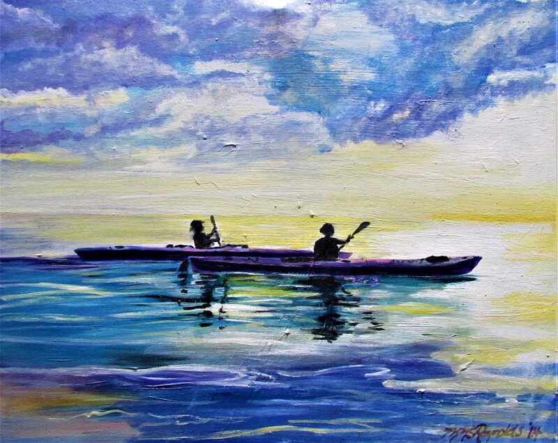 Ocean kayaking pair at sunset or sunrise